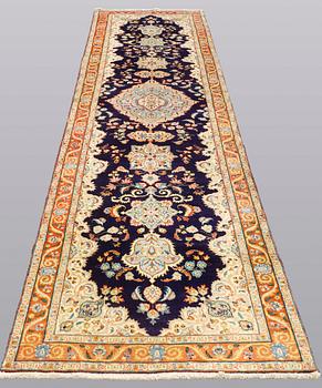 A Tabriz runner, so called Tabatabai, ca 402 x 97 cm.