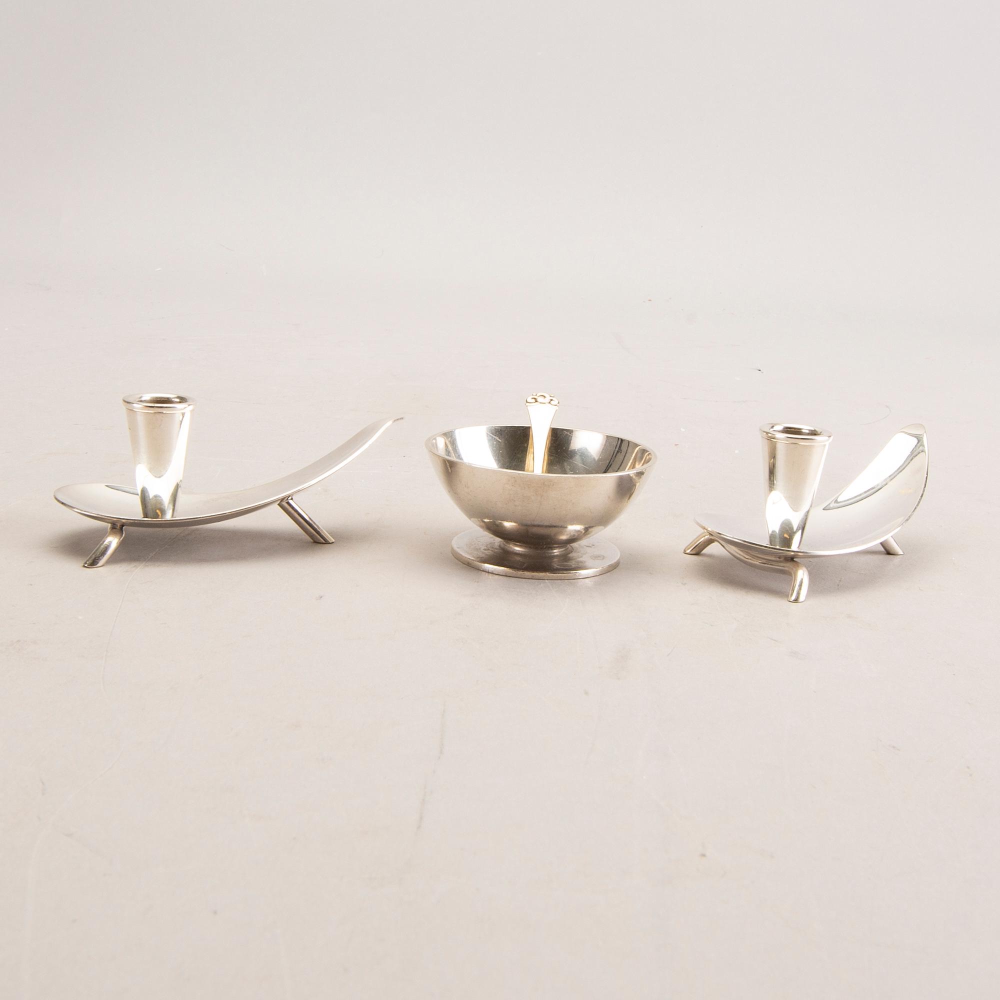 A 20th century Danish salter mark of H Hansen 1937 and two unmarked candlesticks total weight 151 gr.