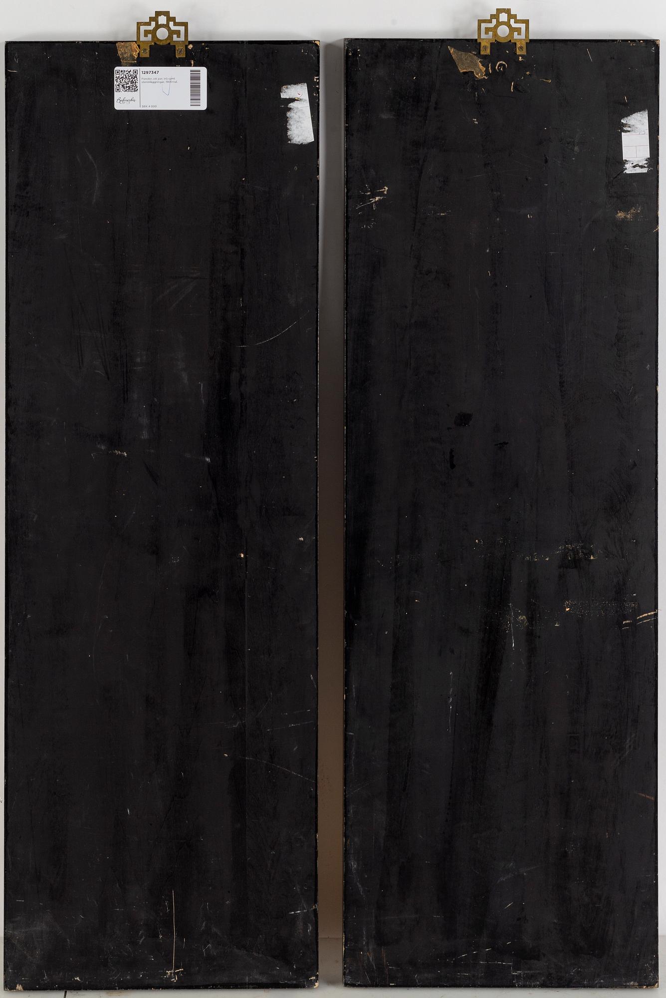 A pair of Chinese wooden panels with stone inlays.
