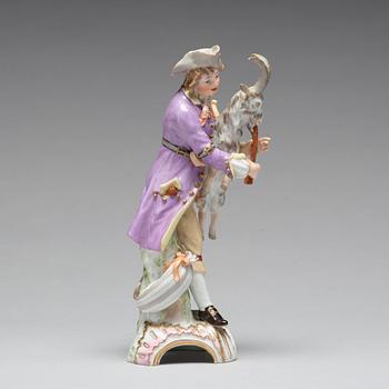 A Berlin porcelain figure of a man with a bagpipe in the shape of a goat, 18th Century.