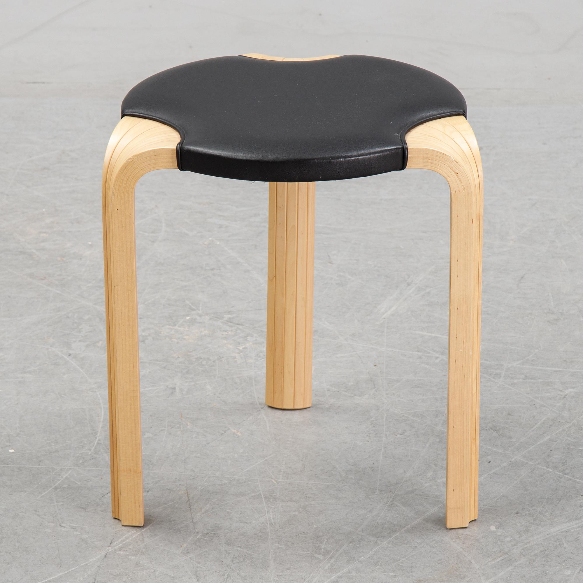 A model Y 601 stool by Alvar Aalto for Artek, dated 2002.