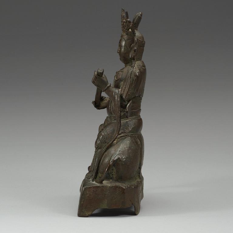 A seated bronze figure of Guanyin on an elephant, Qing dynasty, 19th Century.