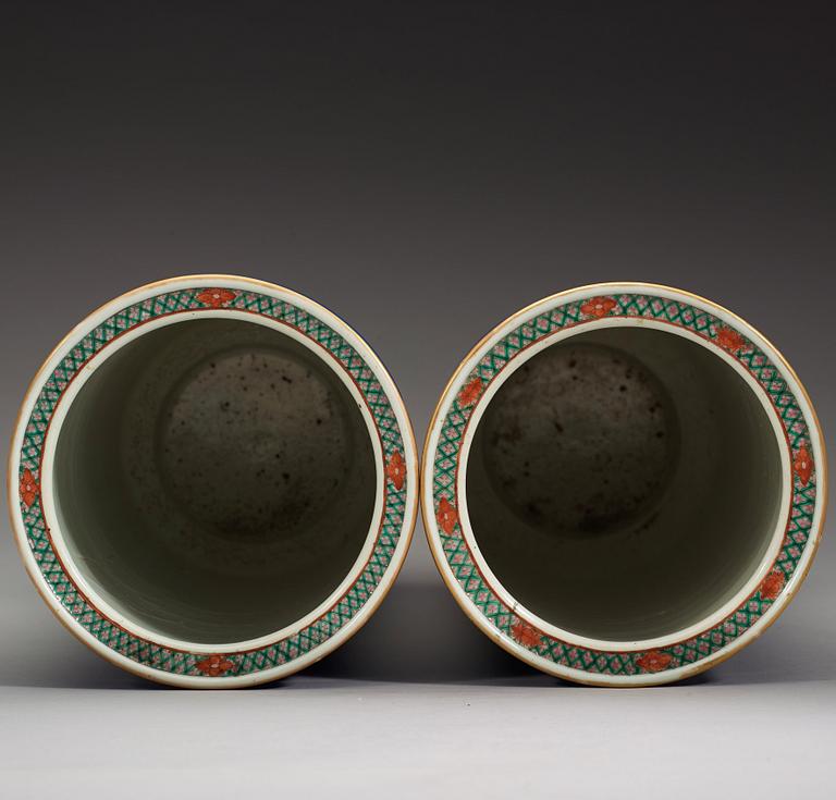 A pair of famille verte and powder blue vases/umbrella stands, Qing dynasty, circa 1900.