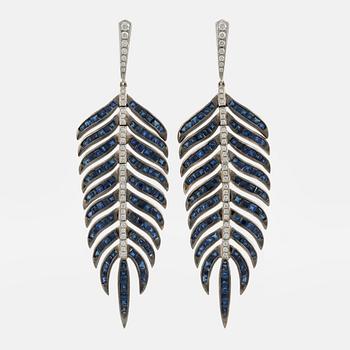 Sapphire and brilliant cut diamond feather earrings.