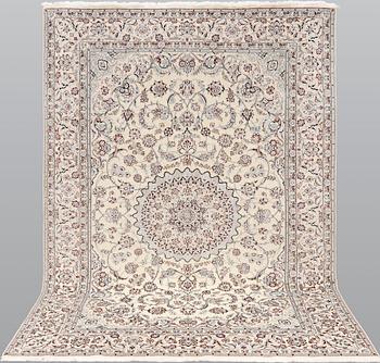 A Nain rug, part silk, so-called 6 LAA, approx. 250 x 163 cm.