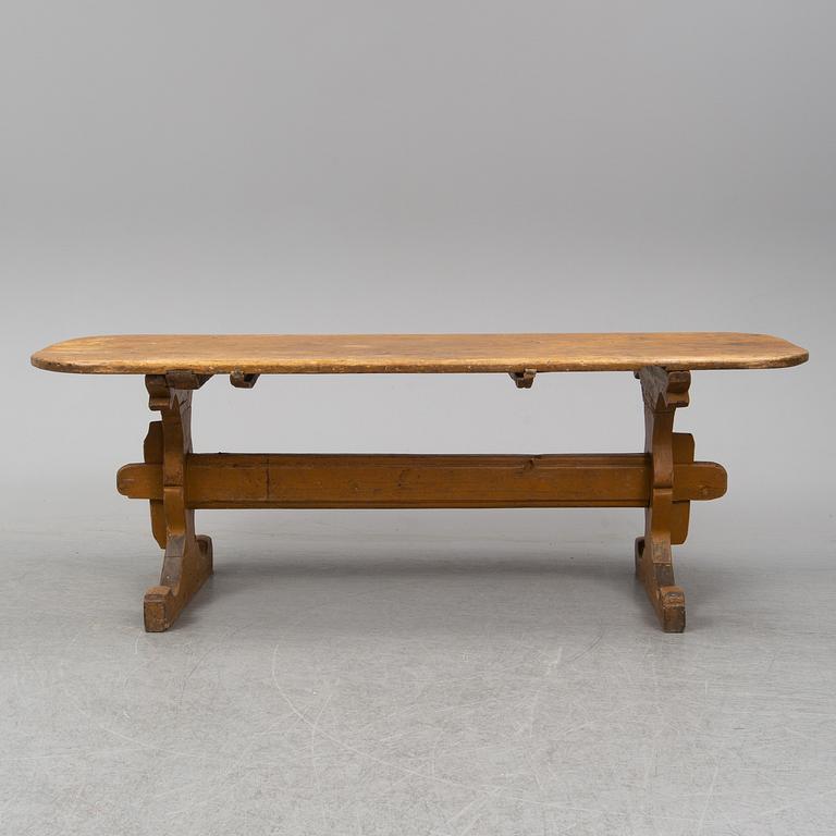 A painted pine table, 19th Century.