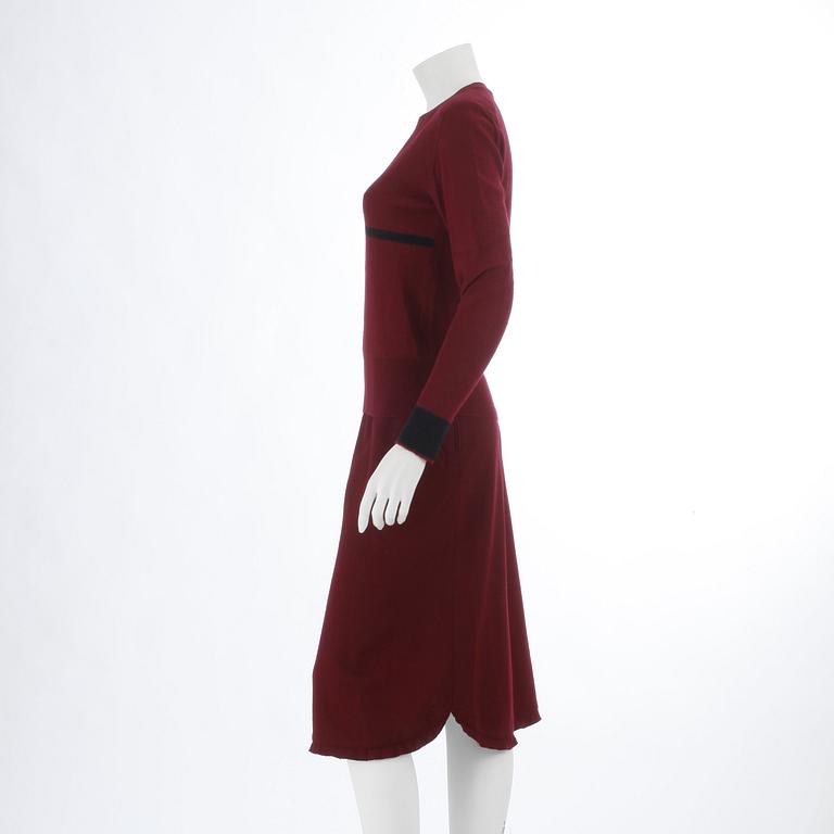 SONIA RYKIEL, a burgundy red sweater and skirt.