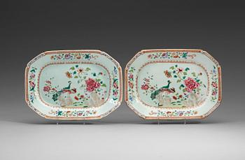 A pair of famille rose 'double peacock' serving dishes, Qing dynasty, Qianlong (1736-95).