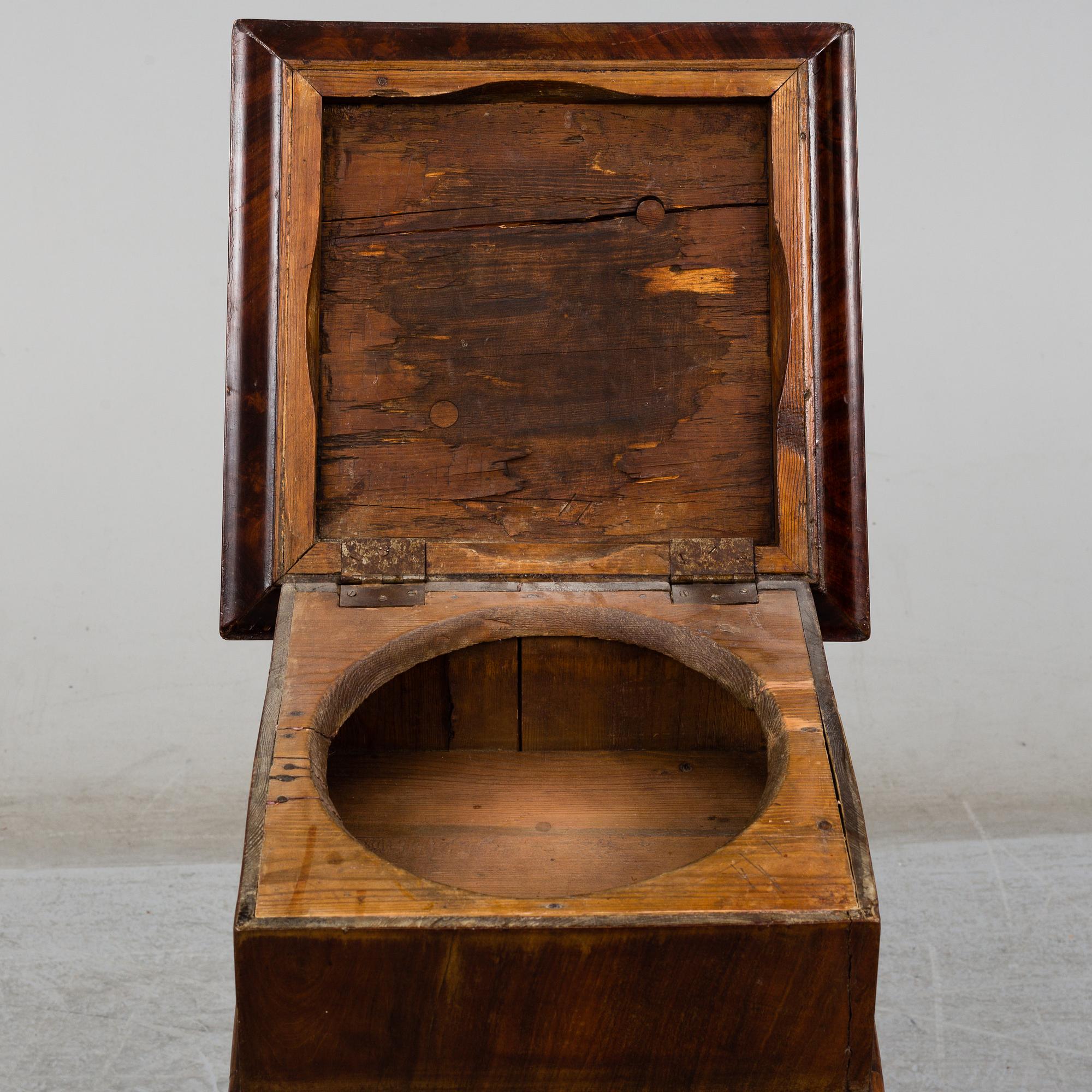 A Swedish Empire bedside table, early 19th century.