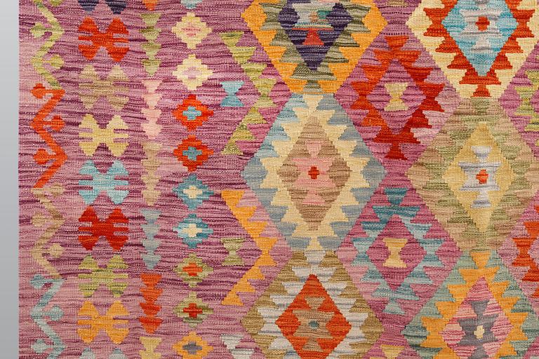 A kilim carpet, ca 345 x 246 cm.