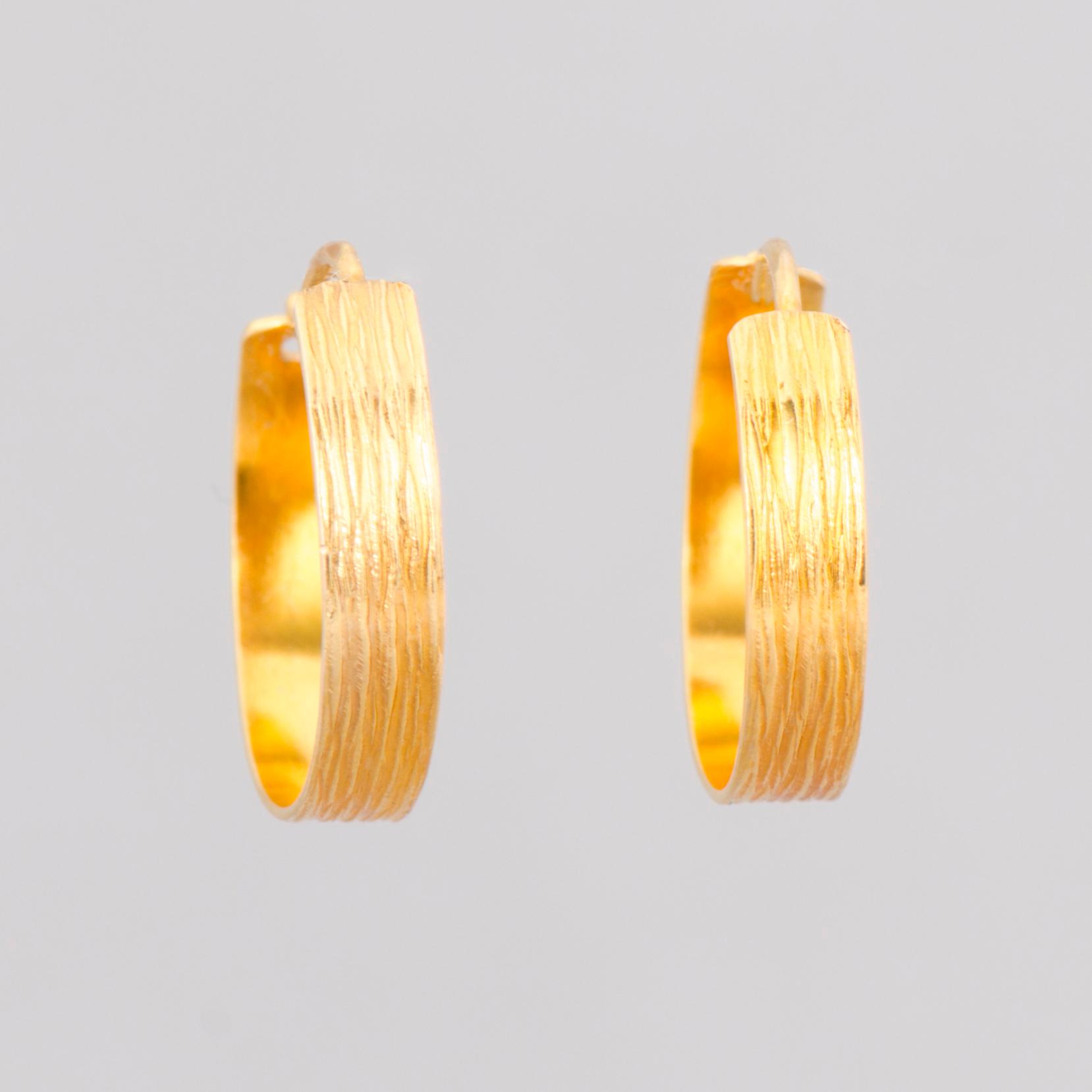 A KULTAKESKUS JEWELLERY SET, necklace, bracelet and earrings, 14K gold. Kultakeskus 1969-80.