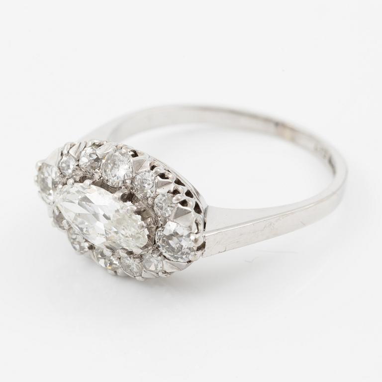 Ring in 18K white gold set with a marquise-cut diamond and old-cut diamonds.