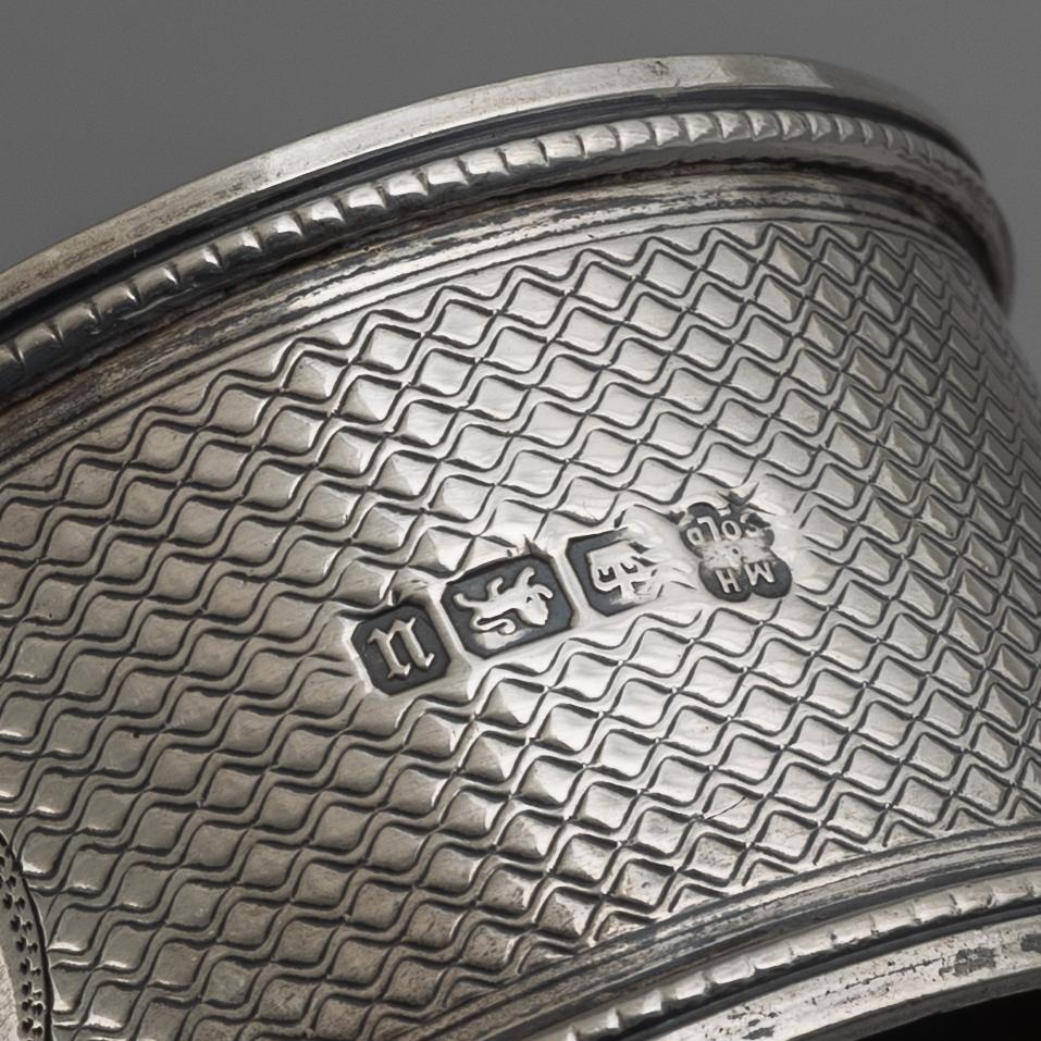 A collection of silver napkin rings, mostly England, Denmark (46 pieces).