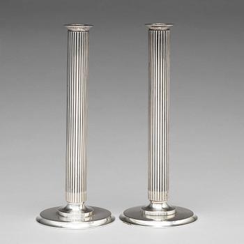 138. Sigvard Bernadotte, a pair of sterling silver candlesticks, Georg Jensen, Copenhagen 1945-77, design nr 855B.