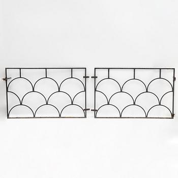A pair of cast iron gates, 1930's.