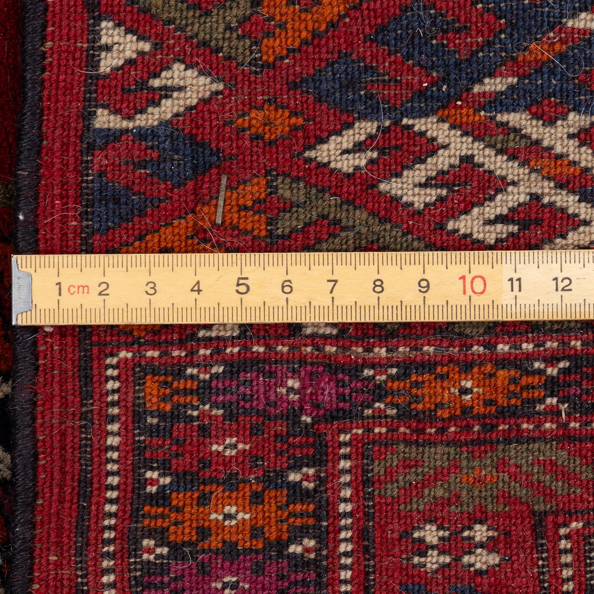 An old Turkmen carpet, c. 235 x 175 cm.