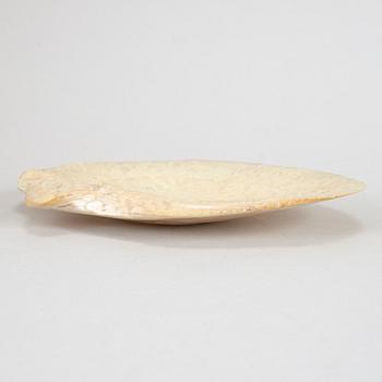 A carved mother-of-pearl shell, late Qing dynasty.