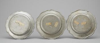Three Swedish pewter plates, from the 1750s.