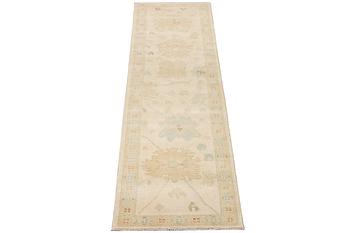 An Ushak runner carpet, c. 360 x 80 cm.