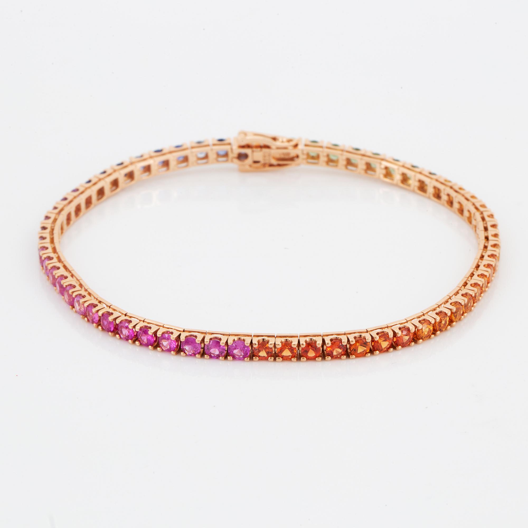 TENNISARMBAND, med multifärgade runda fasettslipade safirer.