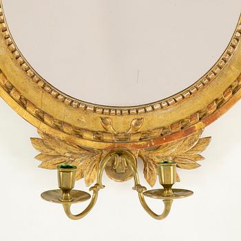 A Swedish Gustavian two-light mirror sconce by Nils Meunier (master in Stockholm 1754-1797).