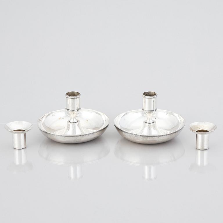 A pair of Swedish early 19th century silver chamber-candlesticks, mark of Adolf Zethelius, Stockholm 1816.