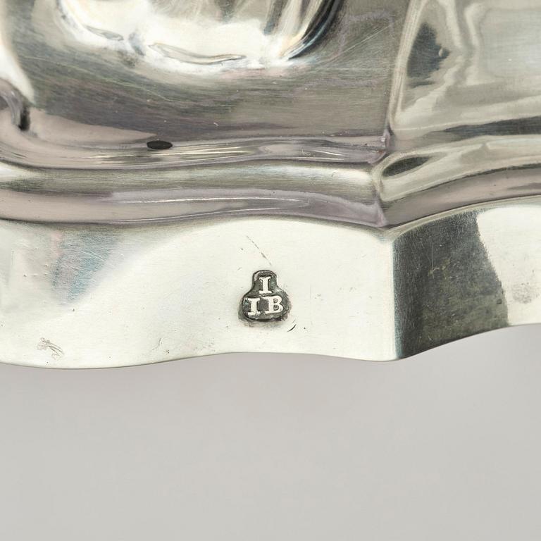 A pair of German silver Rococo candlesticks, marks of Johann Jacob Baur, Augsburg 1777-1779.