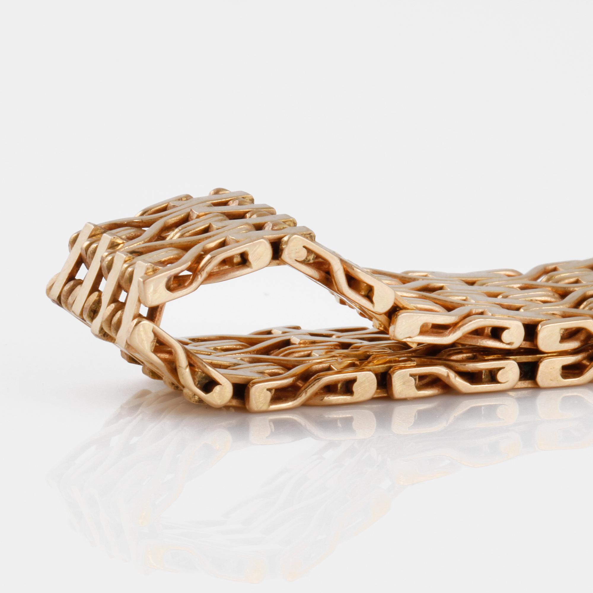 ARMBAND, importstämplat.