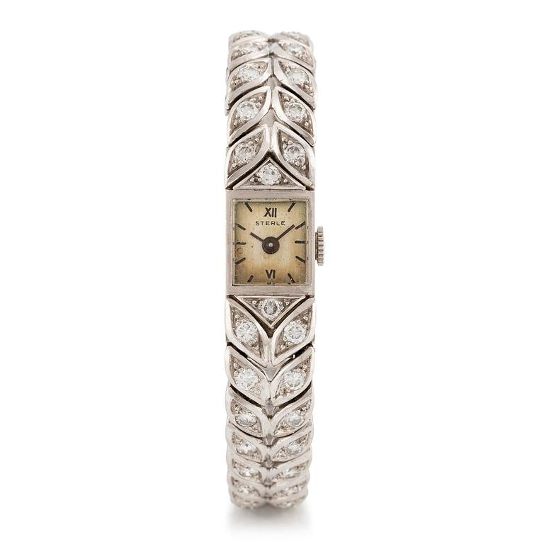 Sterlé armbandsur platina med runda briljantslipade diamanter.