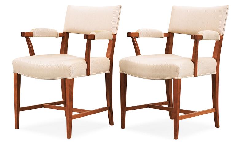A pair of Josef Frank mahogany armchairs, Svenskt Tenn, model 695.