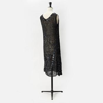 A pearl and sequin embroidered 1920's dress.