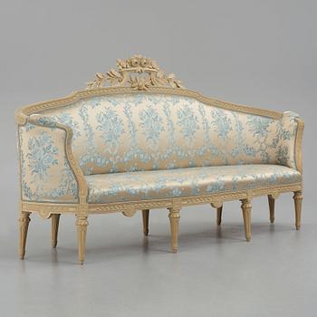 A grey-painted Gustavian 'canapé en corbeille'. sofa, later part of the 18th century.