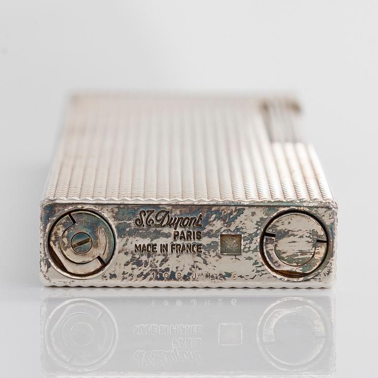 S.T. Dupont, a late 20th century table lighter.