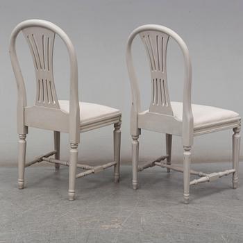 a set of 4+4 gustavian style chairs from the second half of the 20th century.