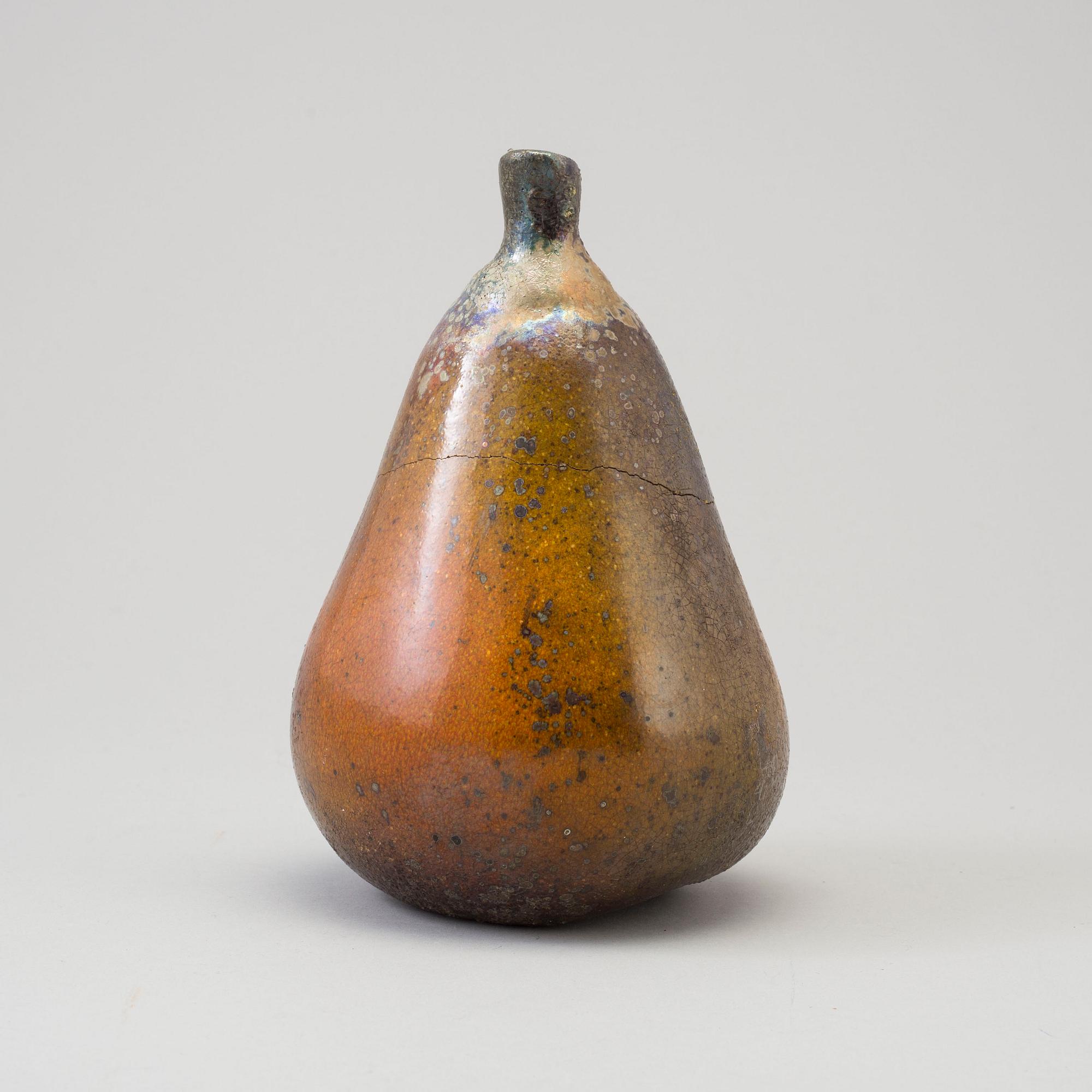 A Hans Hedberg fience sculpture of a pear, Biot, France.