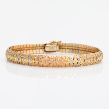 An 18K tri-colour gold bracelet, Italy.