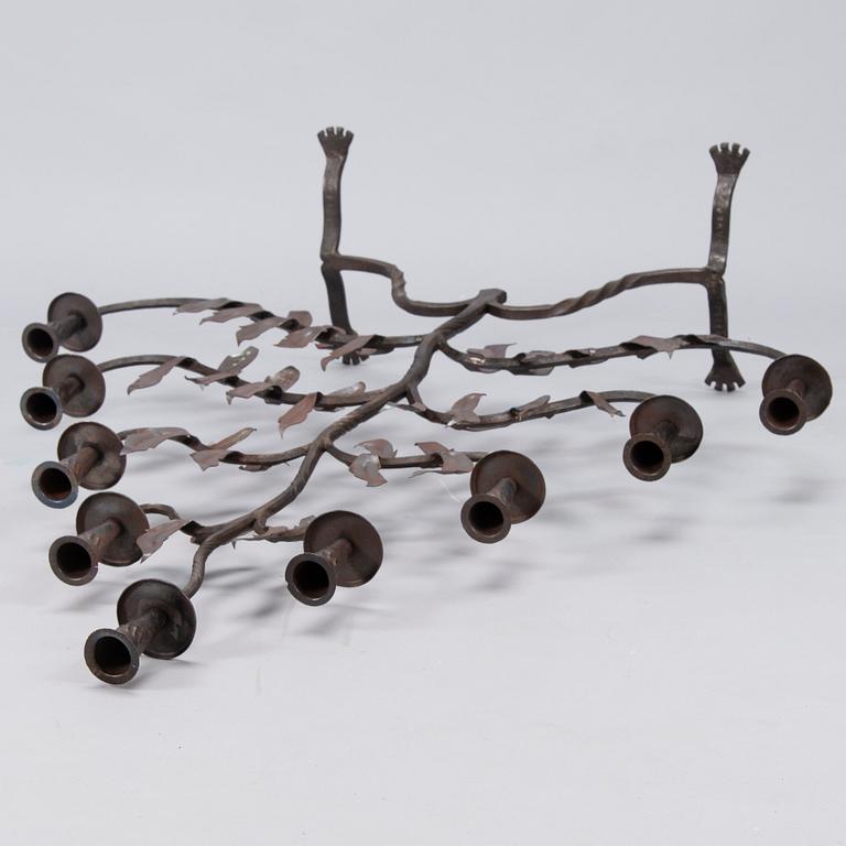 Paavo Tynell, A wrought iron floor candelabrum, oy Taito ab, dated 1926.