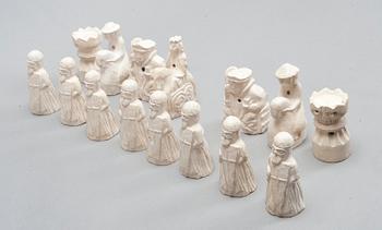 A SET OF  31 PLASTER AND WOODEN CHESSPIECES.