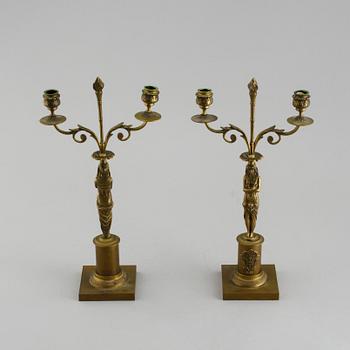 A pair of candelabras in Empire style, 20th century.