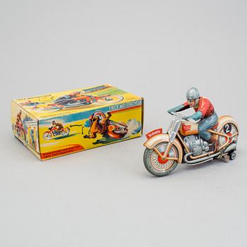 A Technofix tinplate Trick motorcycle, Germany, ca 1950.