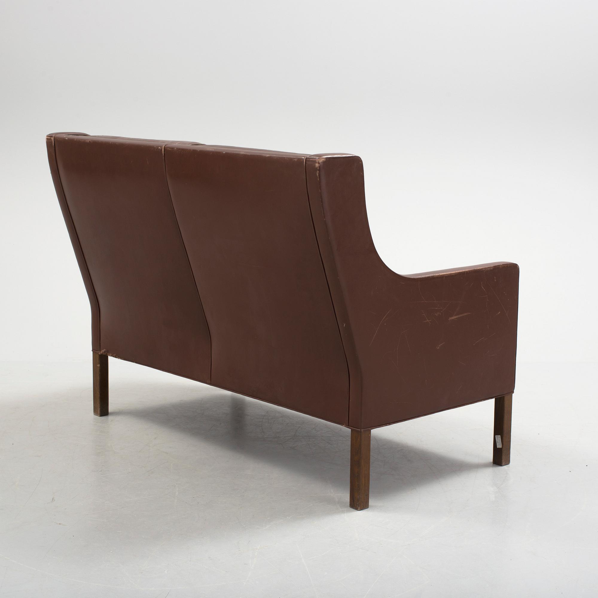 A two-seat leather sofa by Børge Mogensen for Fredrika Stolefabrik, Denmark.
