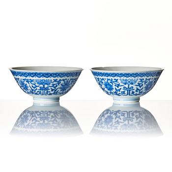 A pair of blue and white lotus bowls, Qing dynasty with Daoguang mark.