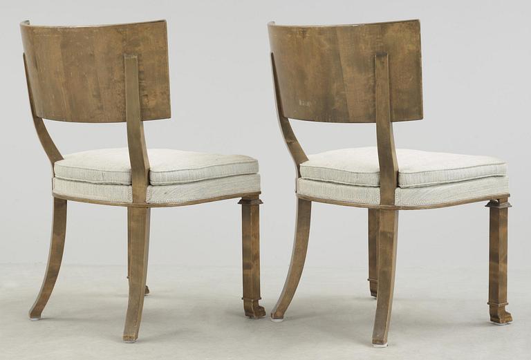 A pair of Axel-Einar Hjorth Swedish Grace antique patinated 'Caesar' chairs, Nordiska Kompaniet, Sweden.