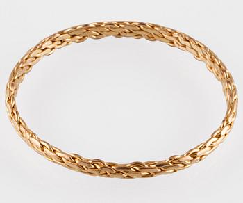 ARMRING, 10K guld, utländsk stämpel. Vikt 24,8 gram.