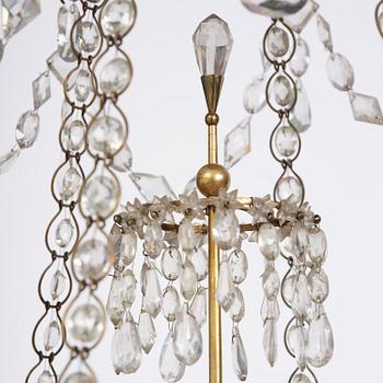 A Late gustavian green top glass six light chandelier.