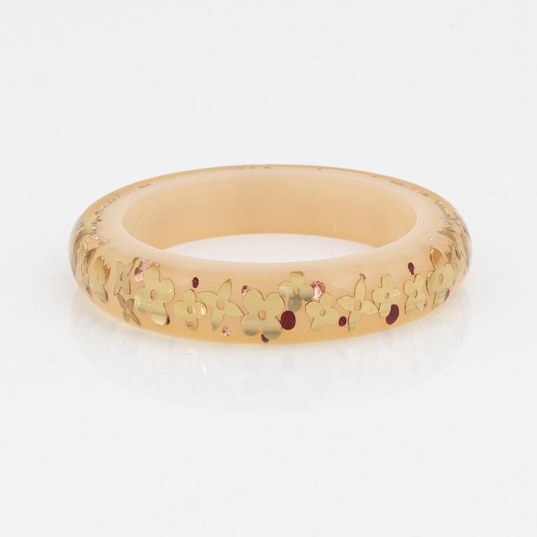 Louis Vuitton, inclusion bangle.