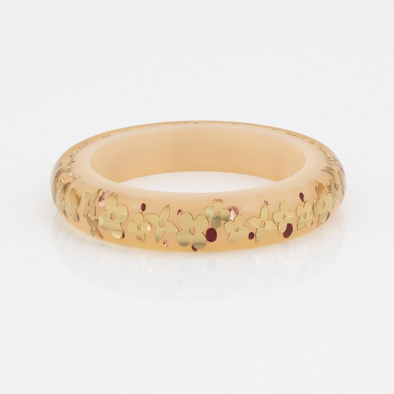 Louis Vuitton, inclusion bangle.