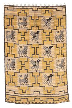 185. Elsa Gullberg, a drape/a textile, "Lejon och Gripar", flat weave with a relief decor of knots, ca 228,5-230 x 148,5-153,5 cm.