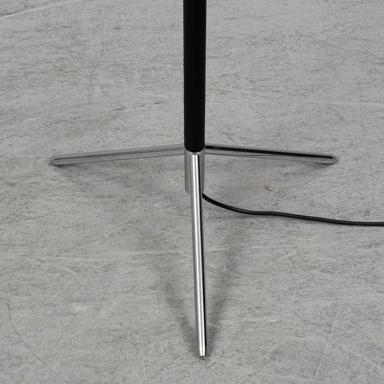 Three contemporary floorlamps by Santa & Cole.