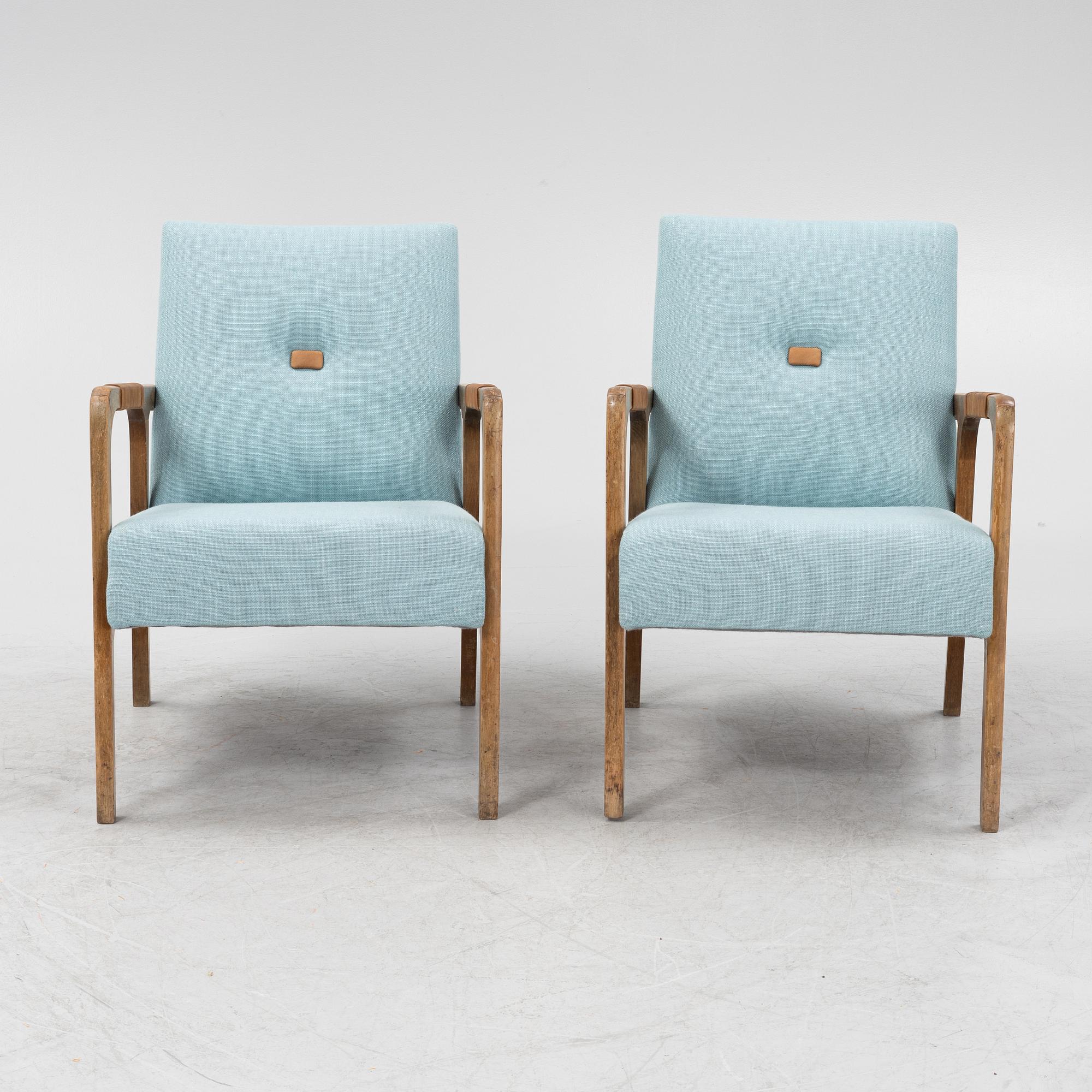 a pair of 1950's armchairs.